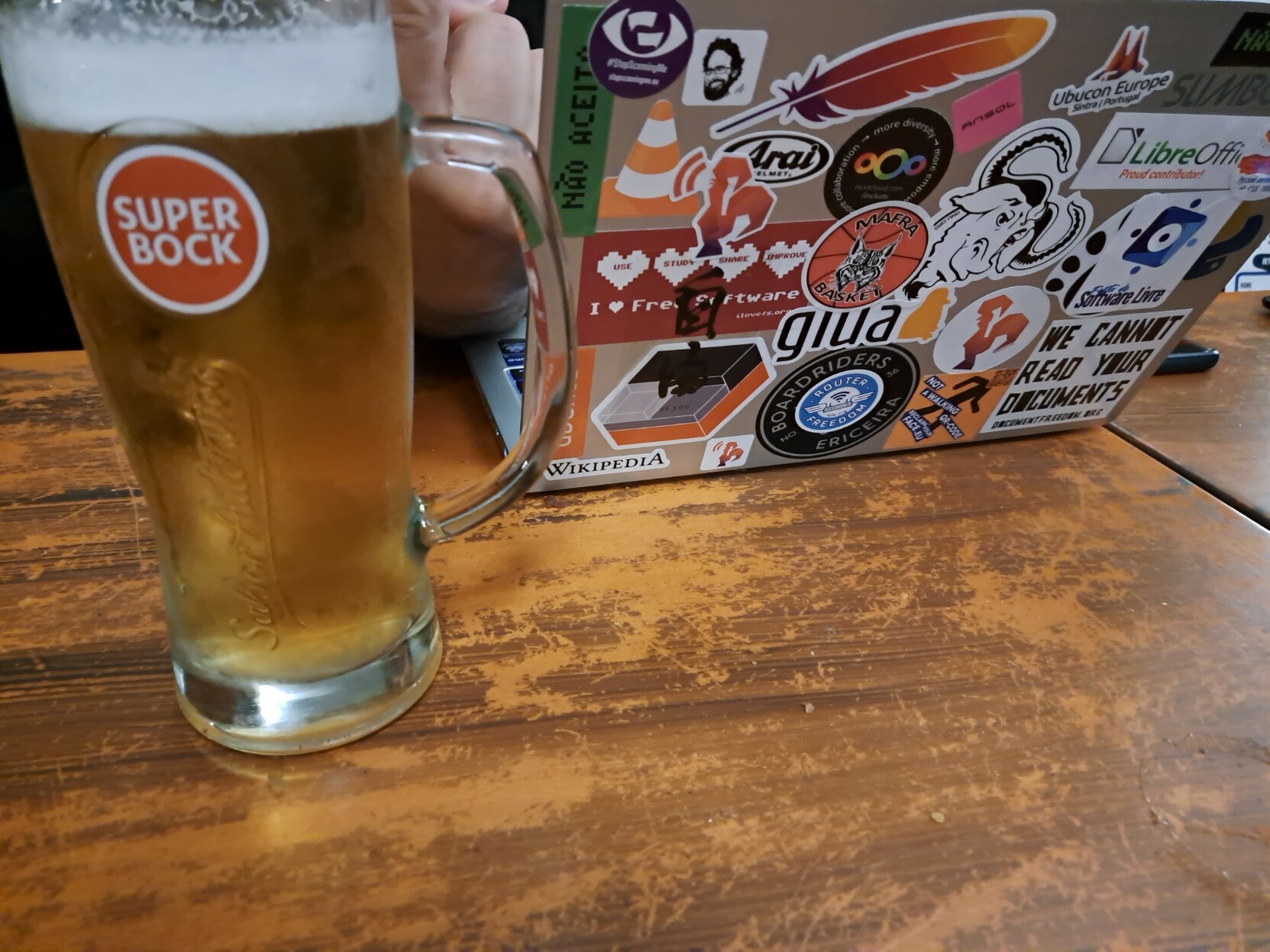Preparatory meeting with some beer and a laptop full of stickers