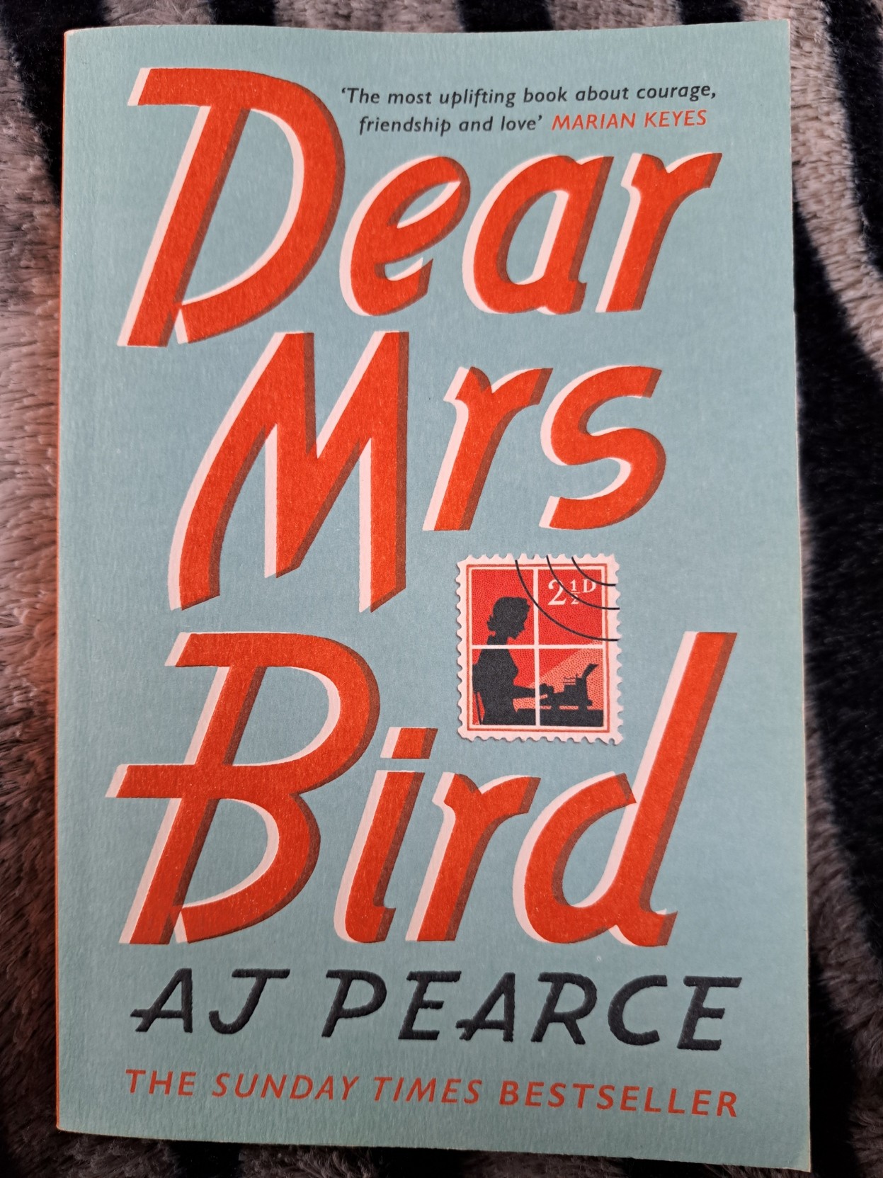 A picture of Picador's paperback edition of AJ Pearce's debut novel "Dear Mrs Bird"