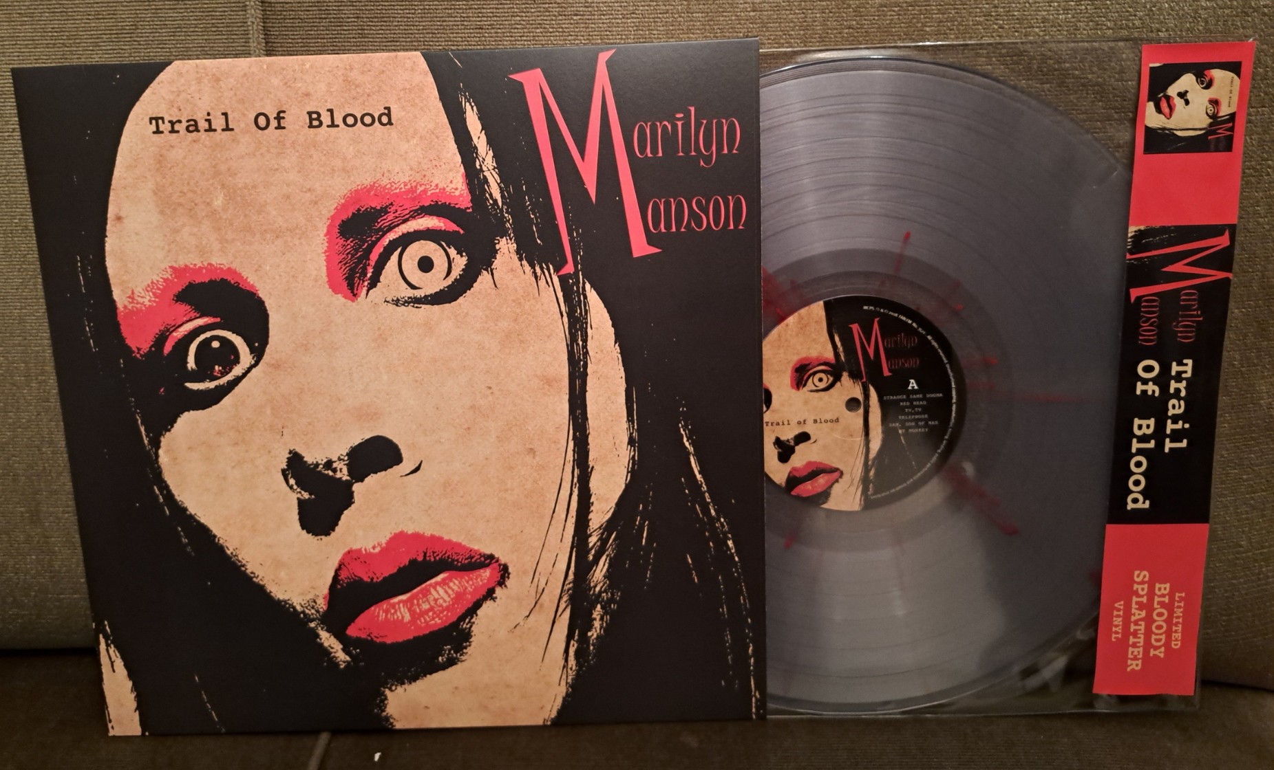Marilyn Manson's "Trail Of Blood", an unofficial record on a blood splattered transparent vinyl (limited edition).