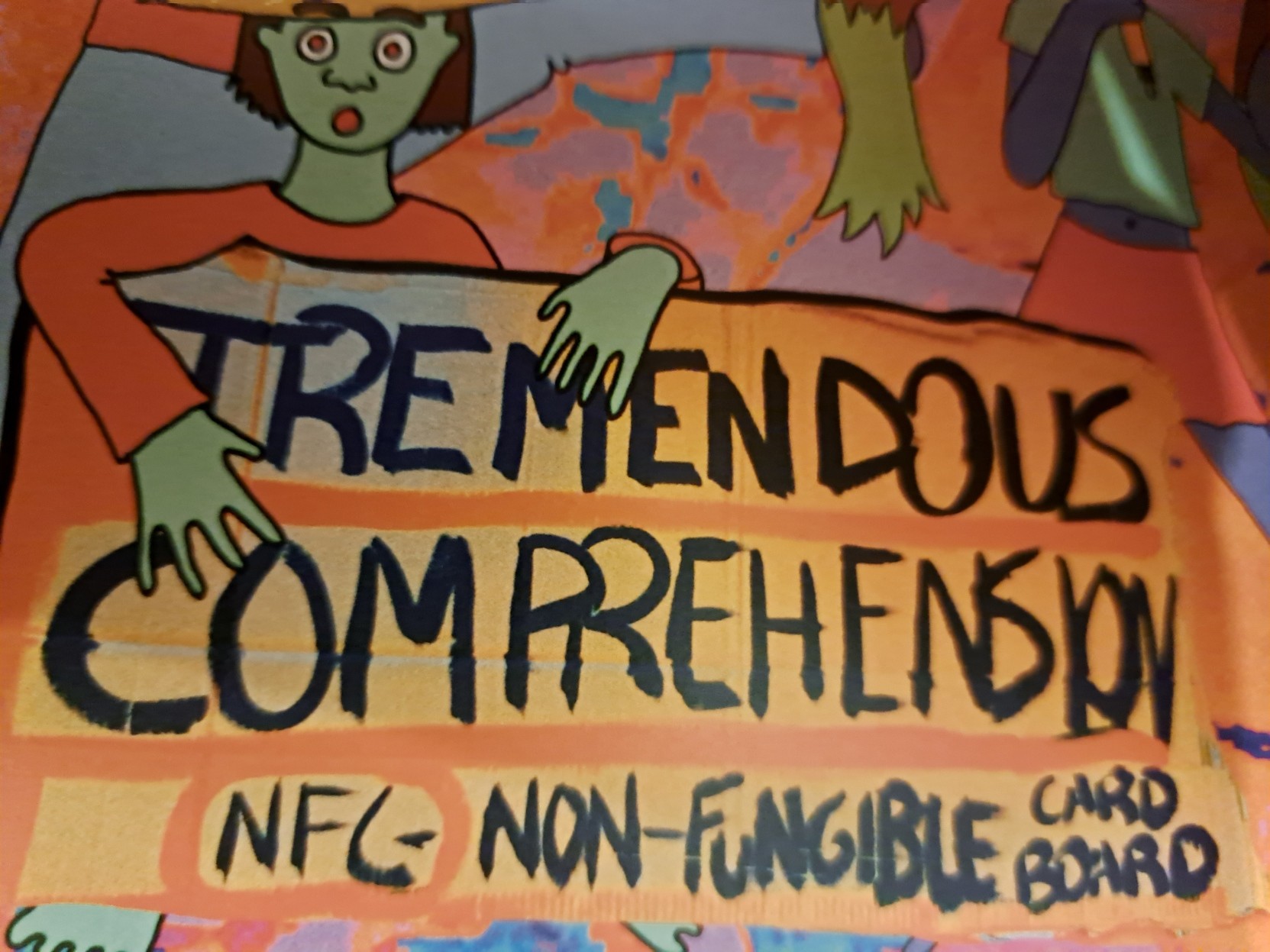 A section from on of the pages, where a character is seen holding a cardboard banner saying:  "Tremendous Comprehension    NFC- Non-Fungible Cardboard"