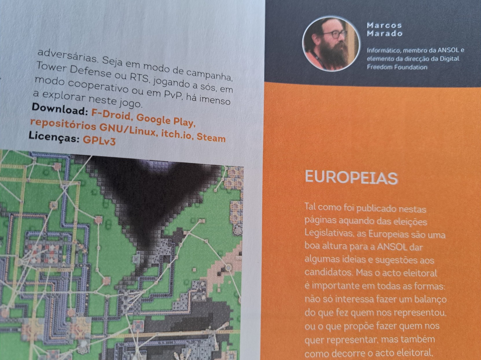 Uma foto de parte da página 25 da PCGuia.  No lado esquerdo, parte de uma captura de ecrã do jogo "Mindustry".  No lado direito, o início do artigo "Europeias", por Marcos Marado.